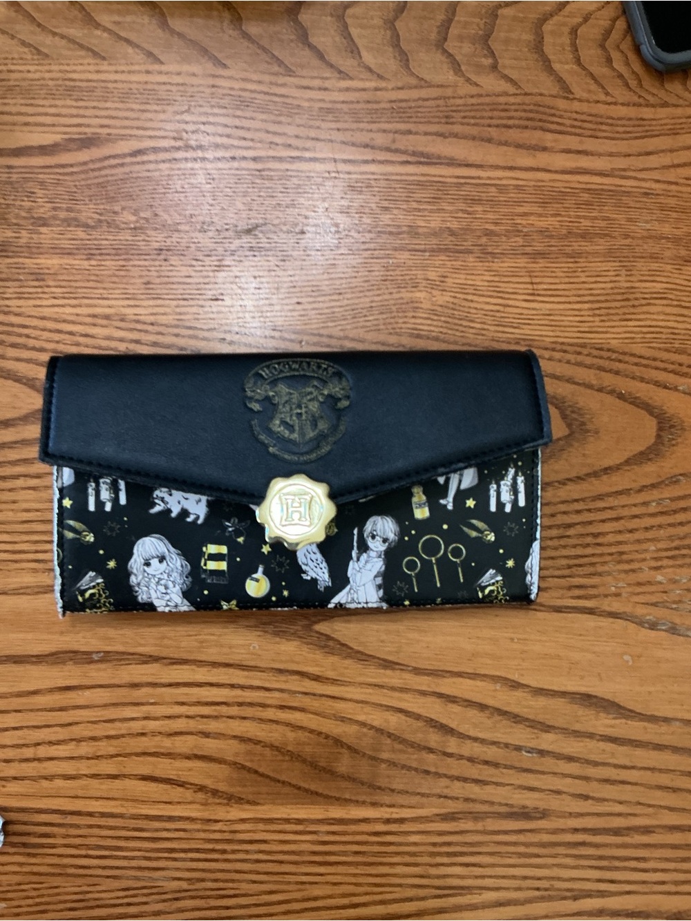 Loungefly Black and Gold Hogwarts Crest Wallet